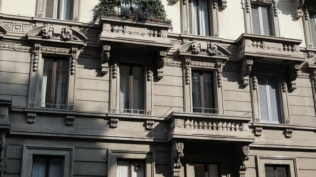 Milan, Italy - February 2025 - Visiting the exterior of the historic buildings of the Lombard capital