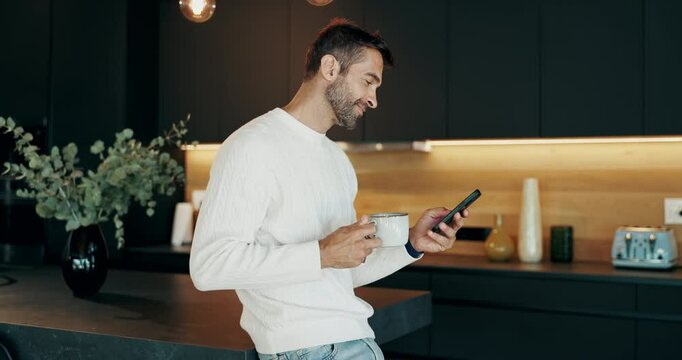 Phone, coffee and man in kitchen in morning at home reading online blog for world news report. Cappuccino, cellphone and male person drinking caffeine latte with politics tabloids in apartment.