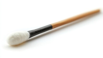 Close-up of a cotton swab on white background
