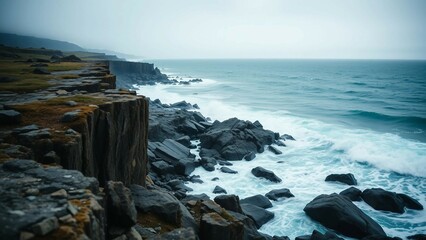 Realistics land is shaped over time by crashing waves against weathered rocks creating a rugged and