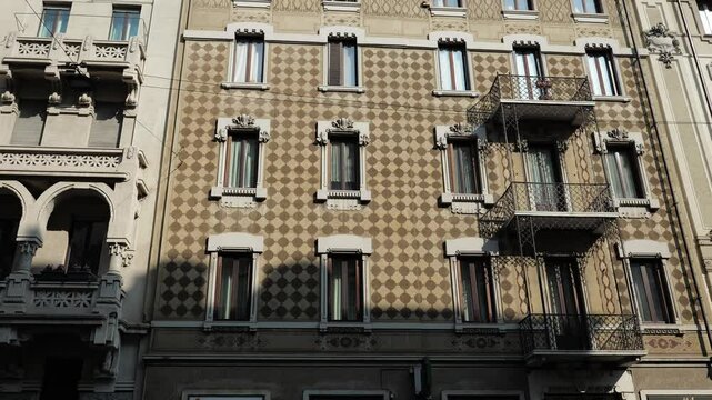 Milan, Italy - February 2025 - Visiting the exterior of the historic buildings of the Lombard capital