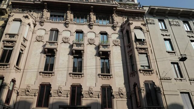 Milan, Italy - February 2025 - Visiting the exterior of the historic buildings of the Lombard capital