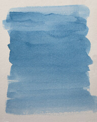 A blue abstract watercolor background. on white watercolor hot pressed paper.