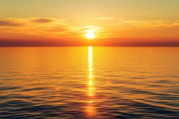 Fototapeta premium Sunset illuminates calm ocean waters with golden hues over vast horizon
