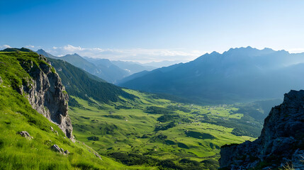 Fototapeta premium Green Valley Between Mountains Under Blue Sky