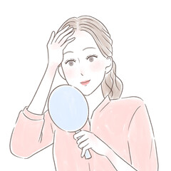 手鏡を見る、髪の生え際の心配が無くなった女性