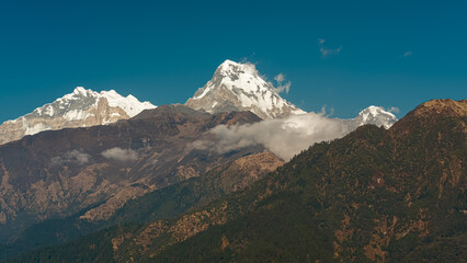 GHOREPANI, NEPAL - JANUARY 9, 2025: Stunning evening views of Annapurna range majestic mountains,...