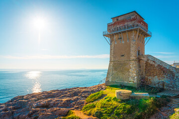 Calafuria tower on the rocks and sea. Livorno, Tuscany region, Italy
