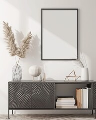A modern living room with a black framed picture hanging above a black console with decorative objects