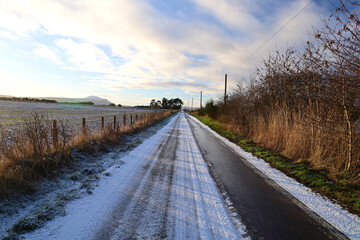 Country road after a light snowfall