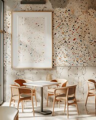 A minimalist dining area with four chairs and a white table in front of a colorful speckled wall. sunlight illuminates the space