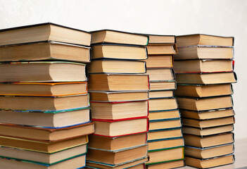 Folded old paper books. Library stacks of old books, bookstore. The concept of learning, reading and cognition, thirst for knowledge. the culture of reading