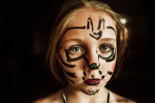 Portrait of a girl who painted her face