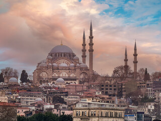 Fototapeta premium Scenic view of Istanbul's skyline at sunset, showcasing the historic mosque, elegant minarets, and a picturesque waterfront enriched by vibrant colors and cultural charm, Istanbul, Turkey