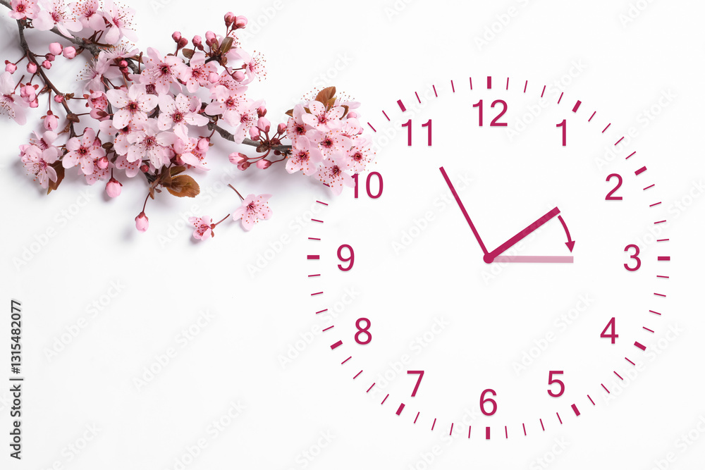 Poster clock and blossoming branch with pink flowers on white background, top view. arrow showing time chan