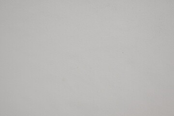 A white background with a few small dots