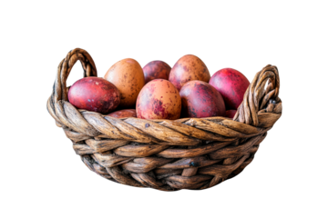 Colorful easter eggs in a woven basket isolated on transparent background