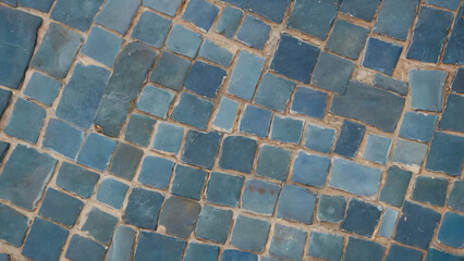 Fototapeta premium Old, broken blue tile floor