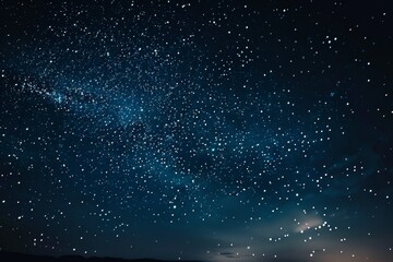 Fototapeta premium A mesmerizing night sky filled with countless stars illuminates the dark desert landscape, A star-filled sky illuminating the desert night with its timeless beauty