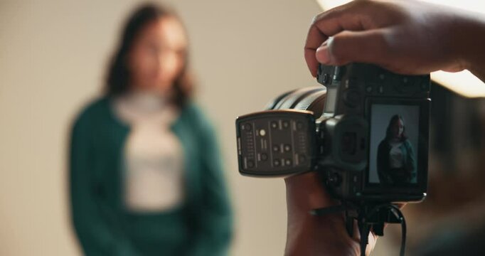 Hands, photographer and screen of camera with model on set for catalog, magazine or production. Creative, fashion and stylish woman behind the scenes in studio for professional photography session