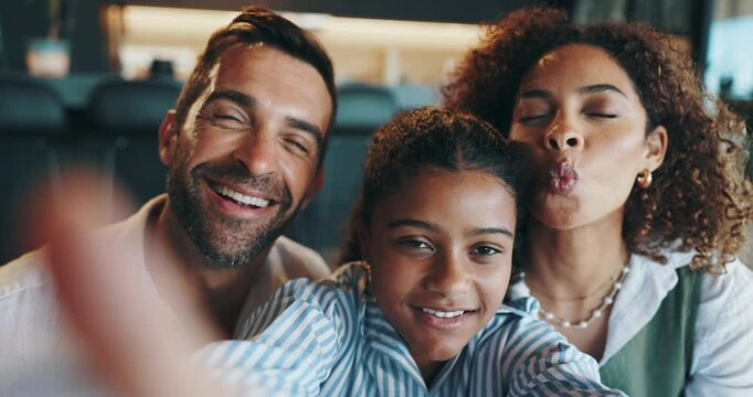 Funny face, happy family and selfie with child in home for love, kiss and interracial parents. Portrait, mother and father with playful kid for silly photography, pov or social media with tongue out