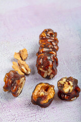 Grape Molasses Sausage with Walnuts. Traditional Turkish dessert; Walnut sausage. It is made with...
