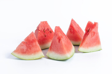 Closeup of juicy watermelon slices on a white background