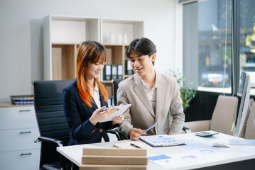 Female discussing new project with male colleague. Young woman talking