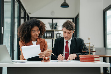 business team and lawyers discussing contract papers sitting at the table. Concepts of law, advice, legal services. at office