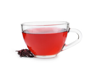 Delicious hibiscus tea in glass cup and dry roselle sepals isolated on white