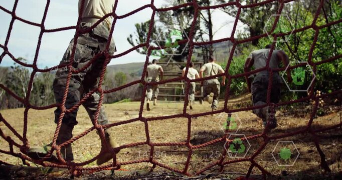 Running through obstacle course, military personnel with animation of digital data overlay