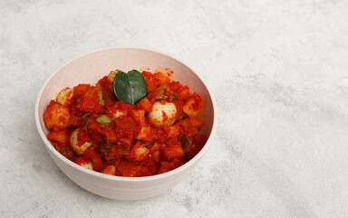 Sambal Goreng Ati Kentang, javanese (Indonesia) traditional food. Served in cream bowl. Copy space. Eid Al Fitr identical food