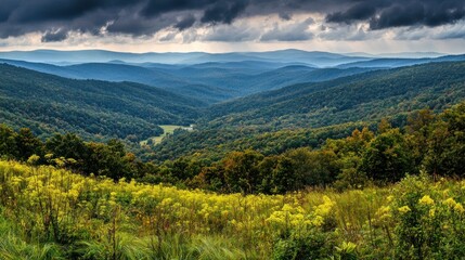 Majestic Mountain Panorama: A Breathtaking View of Rolling Hills and Lush Foliage Under a Dramatic Sky