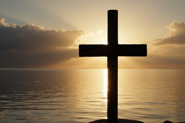 A Serene Silhouette of a Cross Against a Stunning Sunset Over Water, Symbolizing Faith and Reflection