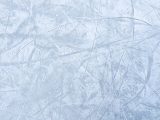 Ice background with marks from skating and hockey. Ice hockey rink scratches surface