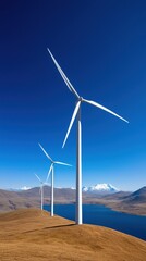 Clean Energy: Wind Turbines Generating Electricity Over Mountain Lake and Scenic Landscape