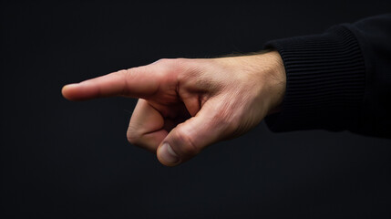 man hand pointing close up of men hand on black background point