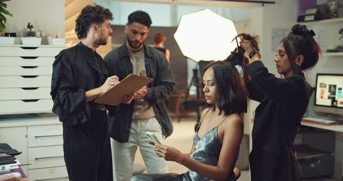 Phone, hair stylist or woman in studio backstage for production, photoshoot preparation or talk. Beauty, cosmetics or model on set with artist for haircare, creative or crew planning with hairdresser