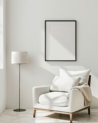 White armchair with a throw blanket in a modern living room with a floor lamp and a blank frame on the wall