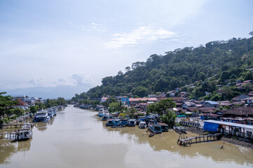 Traditional wooden boats anchor at Batang Arau or Arau River, Padang West Sumatera