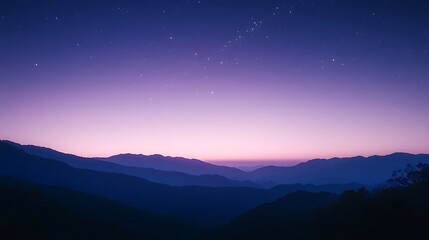 Fototapeta premium Serene twilight landscape with silhouettes of mountains under a starry sky.