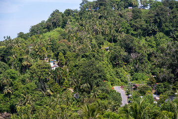 Green hill and village houses on Gunuang Padang, Padang, West Sumatra.