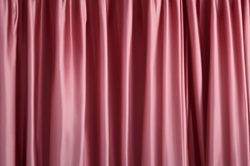 pink silk fabric, delicate satin with soft pleats for designer, text mockup, cards, luxury concept. Smooth elegant golden silk or satin texture can use as background. Retro style