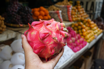 Fresh Dragon Fruit Held in Hand