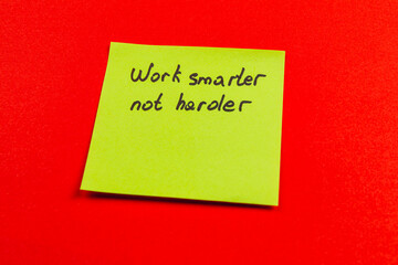 Message on sticky note encouraging efficient work practices