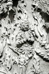 Traditional Thai stucco art at a temple in Thailand.