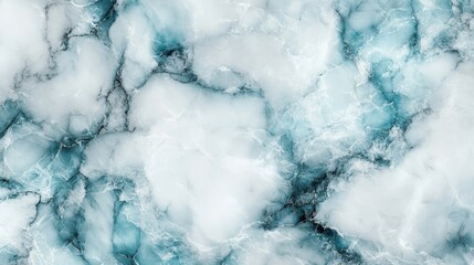 Stunning teal and white marble texture. Ideal for backgrounds, websites, or design projects needing a luxurious, cool aesthetic.