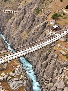 Chicham bridge is suspension stiffened steel truss bridge at altitude of 4145m over 1000 feet gorge of 'samba lamba' rivulet connecting Chicham & kibber villages in Spiti valley of Himachal Pradesh.