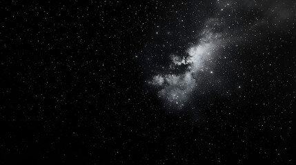 Fototapeta premium Vast Expanse of Deep Space Showing a Bright White Nebula Surrounded by Countless Stars in the Dark Night Sky