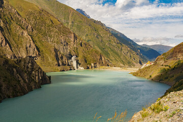 Scenic view of kambar ata 2 hydroelectric power station and reservoir in kyrgyzstan